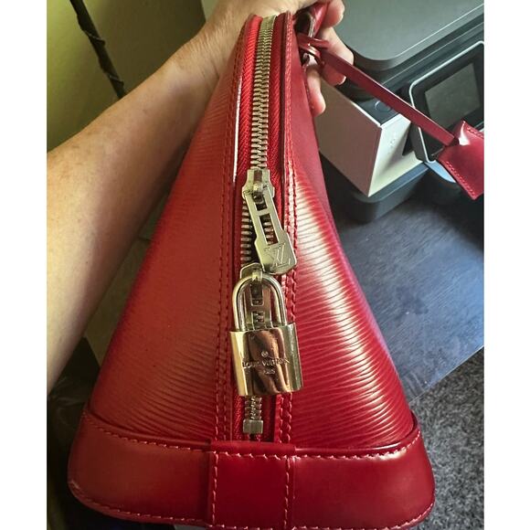 LOUIS VUITTON FUCHSIA RED ALMA WITH SILVER HARDWARE; LOCK & KEYS AND CLOCHETTE - Picture 7 of 14